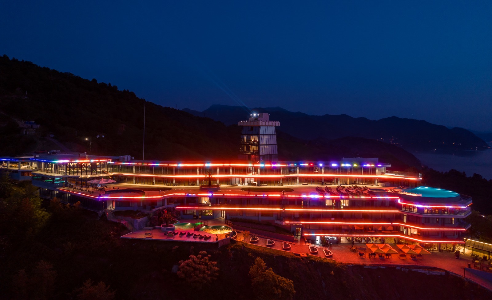 Litz resort illuminated at night with warm golden lights